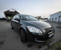 Серый Киа Сид, объемом двигателя 2 л и пробегом 193 тыс. км за 5900 $, фото 1 на Automoto.ua