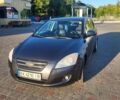 Серый Киа Сид, объемом двигателя 1.4 л и пробегом 258 тыс. км за 5499 $, фото 1 на Automoto.ua