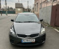 Серый Киа Сид, объемом двигателя 1.4 л и пробегом 227 тыс. км за 6000 $, фото 1 на Automoto.ua