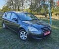 Серый Киа Сид, объемом двигателя 1.4 л и пробегом 219 тыс. км за 5850 $, фото 1 на Automoto.ua