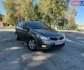 Серый Киа Сид, объемом двигателя 1.59 л и пробегом 210 тыс. км за 6499 $, фото 1 на Automoto.ua