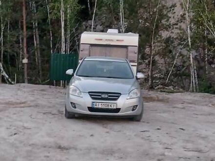 Серый Киа Сид, объемом двигателя 2 л и пробегом 292 тыс. км за 8000 $, фото 1 на Automoto.ua