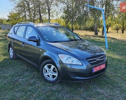 Серый Киа Сид, объемом двигателя 1.4 л и пробегом 219 тыс. км за 5850 $, фото 1 на Automoto.ua