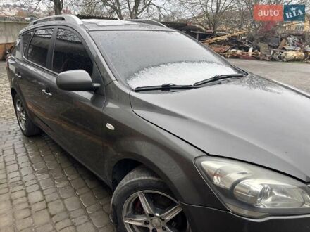 Серый Киа Сид, объемом двигателя 1.58 л и пробегом 300 тыс. км за 6000 $, фото 1 на Automoto.ua