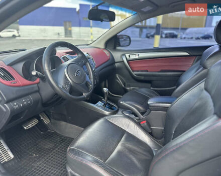 Белый Киа Cerato KOUP, объемом двигателя 2 л и пробегом 125 тыс. км за 8150 $, фото 7 на Automoto.ua