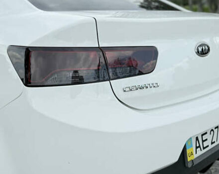 Белый Киа Cerato KOUP, объемом двигателя 1.6 л и пробегом 114 тыс. км за 10000 $, фото 9 на Automoto.ua