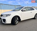 Белый Киа Cerato KOUP, объемом двигателя 2 л и пробегом 151 тыс. км за 10990 $, фото 1 на Automoto.ua