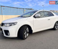 Белый Киа Cerato KOUP, объемом двигателя 2 л и пробегом 151 тыс. км за 10990 $, фото 1 на Automoto.ua