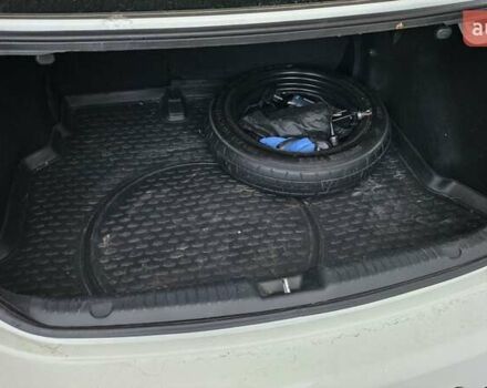 Белый Киа Cerato KOUP, объемом двигателя 2 л и пробегом 138 тыс. км за 8300 $, фото 11 на Automoto.ua