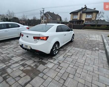 Белый Киа Cerato KOUP, объемом двигателя 2 л и пробегом 138 тыс. км за 8300 $, фото 4 на Automoto.ua