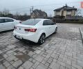 Белый Киа Cerato KOUP, объемом двигателя 2 л и пробегом 138 тыс. км за 8300 $, фото 4 на Automoto.ua