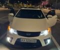 Белый Киа Cerato KOUP, объемом двигателя 2 л и пробегом 107 тыс. км за 10600 $, фото 1 на Automoto.ua
