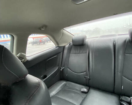 Білий Кіа Cerato KOUP, об'ємом двигуна 2 л та пробігом 87 тис. км за 9800 $, фото 5 на Automoto.ua