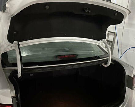 Білий Кіа Cerato KOUP, об'ємом двигуна 2 л та пробігом 87 тис. км за 9800 $, фото 12 на Automoto.ua