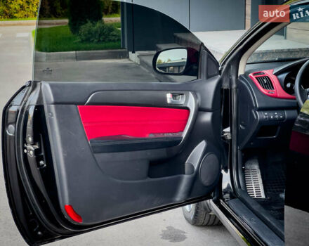 Чорний Кіа Cerato KOUP, об'ємом двигуна 2 л та пробігом 265 тис. км за 6800 $, фото 21 на Automoto.ua