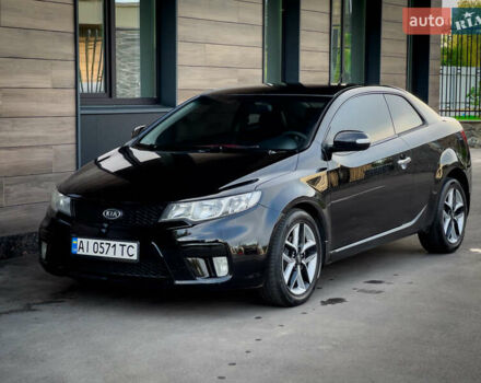Чорний Кіа Cerato KOUP, об'ємом двигуна 2 л та пробігом 265 тис. км за 6800 $, фото 18 на Automoto.ua