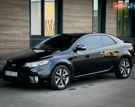 Чорний Кіа Cerato KOUP, об'ємом двигуна 2 л та пробігом 265 тис. км за 6800 $, фото 17 на Automoto.ua
