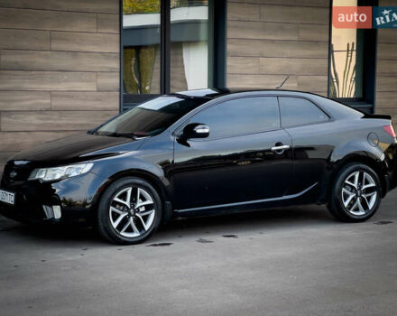 Чорний Кіа Cerato KOUP, об'ємом двигуна 2 л та пробігом 265 тис. км за 6800 $, фото 16 на Automoto.ua
