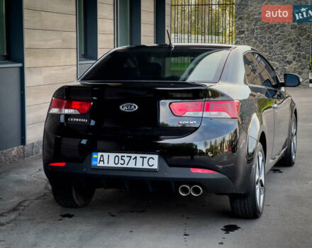 Чорний Кіа Cerato KOUP, об'ємом двигуна 2 л та пробігом 265 тис. км за 6800 $, фото 7 на Automoto.ua