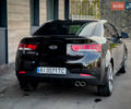 Чорний Кіа Cerato KOUP, об'ємом двигуна 2 л та пробігом 265 тис. км за 6800 $, фото 7 на Automoto.ua