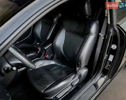 Чорний Кіа Cerato KOUP, об'ємом двигуна 2 л та пробігом 265 тис. км за 6800 $, фото 24 на Automoto.ua