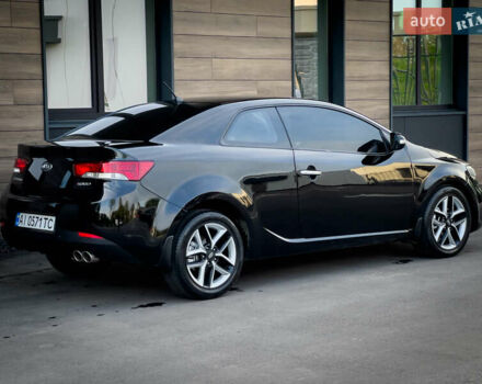 Чорний Кіа Cerato KOUP, об'ємом двигуна 2 л та пробігом 265 тис. км за 6800 $, фото 5 на Automoto.ua