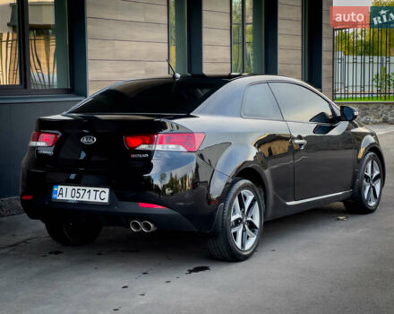 Чорний Кіа Cerato KOUP, об'ємом двигуна 2 л та пробігом 265 тис. км за 6800 $, фото 6 на Automoto.ua