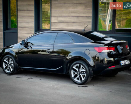 Чорний Кіа Cerato KOUP, об'ємом двигуна 2 л та пробігом 265 тис. км за 6800 $, фото 12 на Automoto.ua