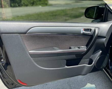 Черный Киа Cerato KOUP, объемом двигателя 2.4 л и пробегом 210 тыс. км за 10000 $, фото 6 на Automoto.ua