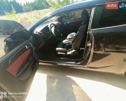 Черный Киа Cerato KOUP, объемом двигателя 2 л и пробегом 250 тыс. км за 7900 $, фото 3 на Automoto.ua