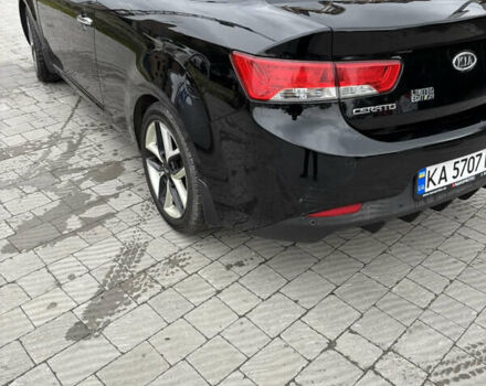 Черный Киа Cerato KOUP, объемом двигателя 2 л и пробегом 204 тыс. км за 8000 $, фото 3 на Automoto.ua