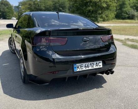 Черный Киа Cerato KOUP, объемом двигателя 2.4 л и пробегом 210 тыс. км за 10000 $, фото 3 на Automoto.ua