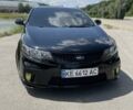 Черный Киа Cerato KOUP, объемом двигателя 2.4 л и пробегом 210 тыс. км за 10000 $, фото 1 на Automoto.ua