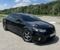 Черный Киа Cerato KOUP, объемом двигателя 2.4 л и пробегом 210 тыс. км за 10000 $, фото 1 на Automoto.ua