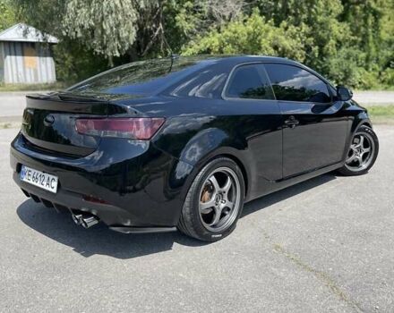 Черный Киа Cerato KOUP, объемом двигателя 2.4 л и пробегом 210 тыс. км за 9000 $, фото 4 на Automoto.ua
