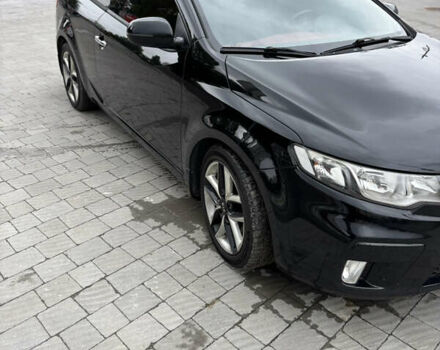 Черный Киа Cerato KOUP, объемом двигателя 2 л и пробегом 204 тыс. км за 8000 $, фото 1 на Automoto.ua