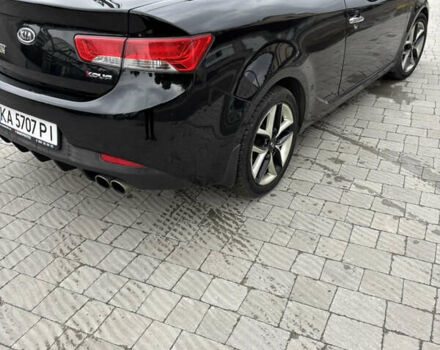 Черный Киа Cerato KOUP, объемом двигателя 2 л и пробегом 204 тыс. км за 8000 $, фото 4 на Automoto.ua