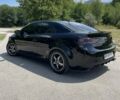 Черный Киа Cerato KOUP, объемом двигателя 2.4 л и пробегом 210 тыс. км за 10000 $, фото 2 на Automoto.ua