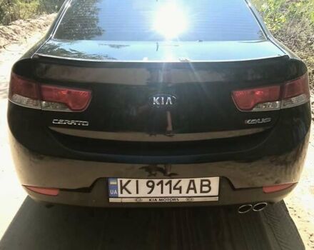 Черный Киа Cerato KOUP, объемом двигателя 2 л и пробегом 250 тыс. км за 7900 $, фото 1 на Automoto.ua
