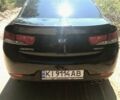 Черный Киа Cerato KOUP, объемом двигателя 2 л и пробегом 250 тыс. км за 7900 $, фото 1 на Automoto.ua