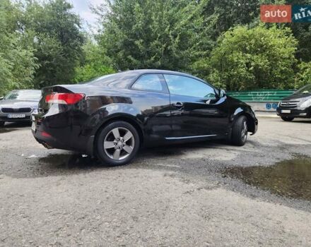 Черный Киа Cerato KOUP, объемом двигателя 1.59 л и пробегом 255 тыс. км за 7650 $, фото 4 на Automoto.ua
