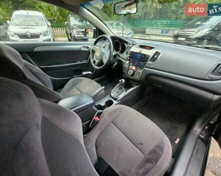 Черный Киа Cerato KOUP, объемом двигателя 1.59 л и пробегом 255 тыс. км за 7650 $, фото 3 на Automoto.ua