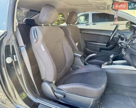 Чорний Кіа Cerato KOUP, об'ємом двигуна 2 л та пробігом 203 тис. км за 7800 $, фото 7 на Automoto.ua