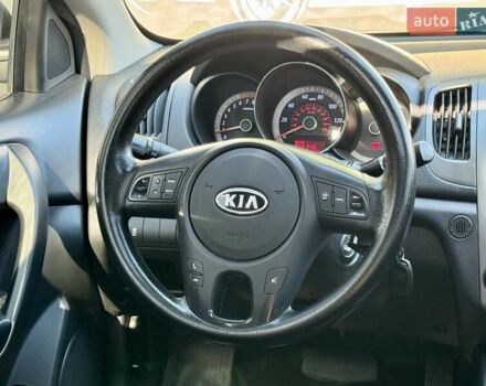 Чорний Кіа Cerato KOUP, об'ємом двигуна 2 л та пробігом 203 тис. км за 7800 $, фото 11 на Automoto.ua