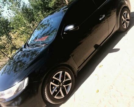 Черный Киа Cerato KOUP, объемом двигателя 2 л и пробегом 250 тыс. км за 7900 $, фото 1 на Automoto.ua