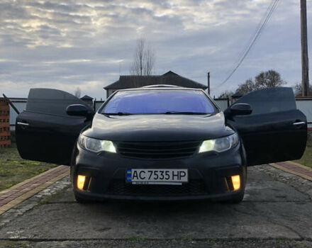 Черный Киа Cerato KOUP, объемом двигателя 2 л и пробегом 230 тыс. км за 8000 $, фото 1 на Automoto.ua
