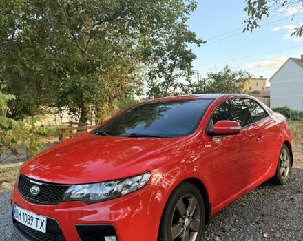 Красный Киа Cerato KOUP, объемом двигателя 1.6 л и пробегом 167 тыс. км за 7000 $, фото 4 на Automoto.ua