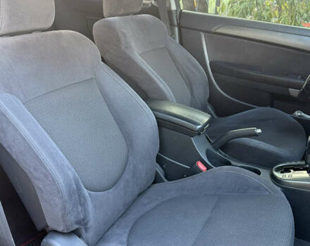 Красный Киа Cerato KOUP, объемом двигателя 1.6 л и пробегом 167 тыс. км за 7000 $, фото 12 на Automoto.ua