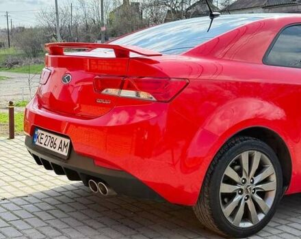 Красный Киа Cerato KOUP, объемом двигателя 2.4 л и пробегом 182 тыс. км за 8500 $, фото 7 на Automoto.ua