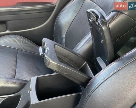 Красный Киа Cerato KOUP, объемом двигателя 2 л и пробегом 107 тыс. км за 10200 $, фото 24 на Automoto.ua